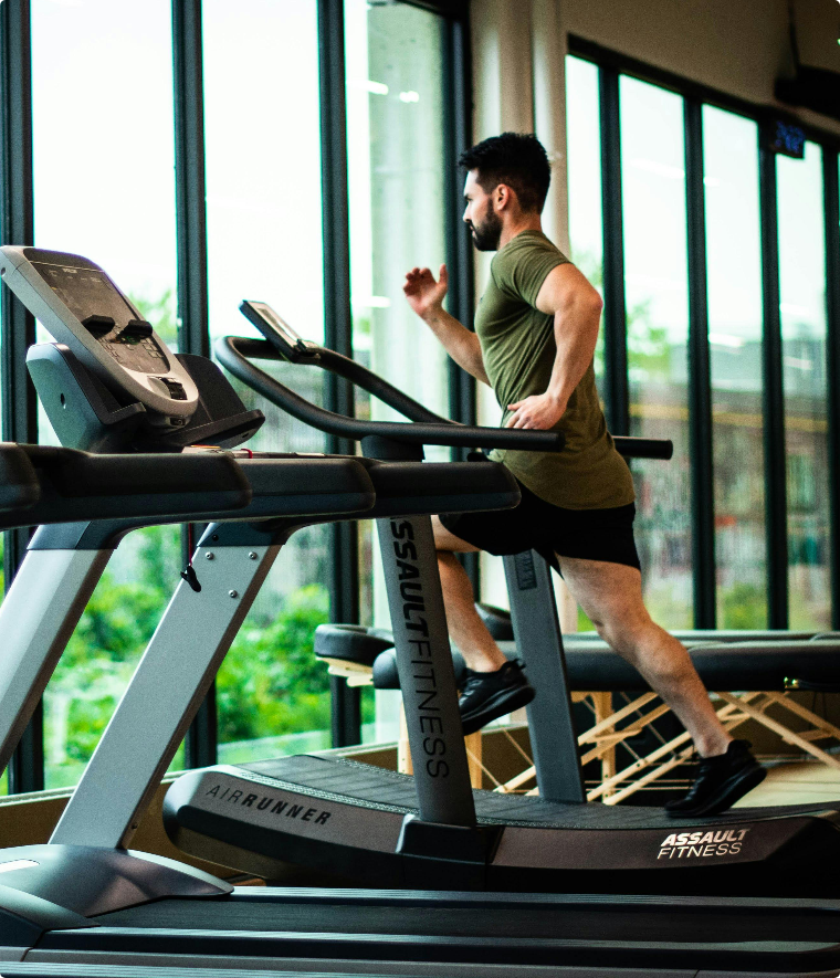 Person Running Treadmills